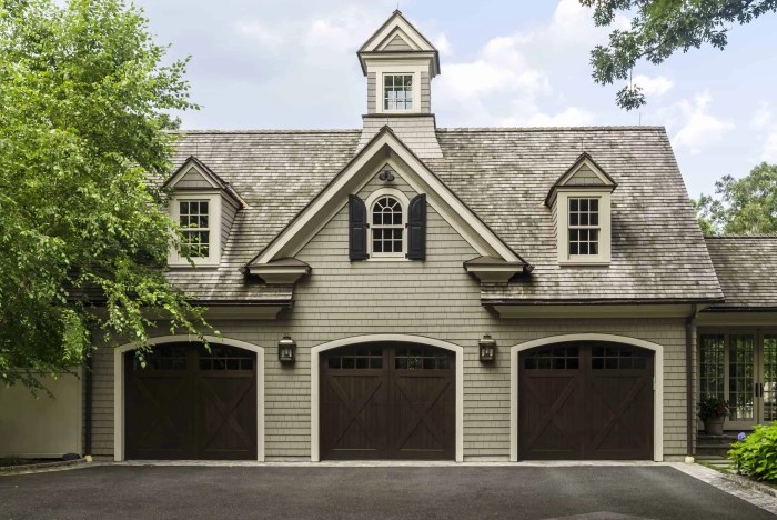 Colonial house on slope garage design